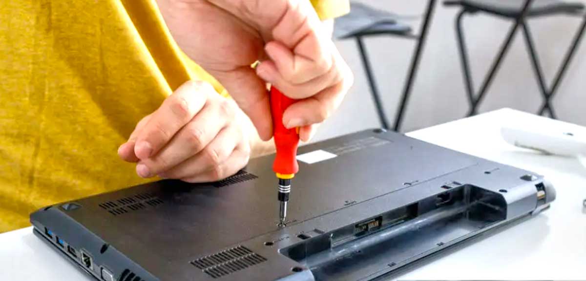 how to remove stripped screw from laptop